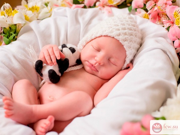 Кроха в кадре: профессиональная фотосъемка новорожденного